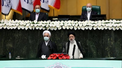 Iranian President Ebrahim Raisi, front right, makes a speech after taking the oath of office in Tehran last week. Getty