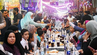 Men, women and children dined together at the iftar in Faisal. Photo: Ali Mohamed