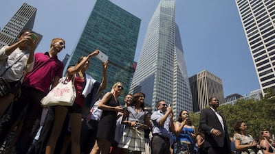 Onlookers watch Rafael Nadal, unseen, during a tennis exhibition in New York City on Tuesday. Lucas Jackson / Reuters