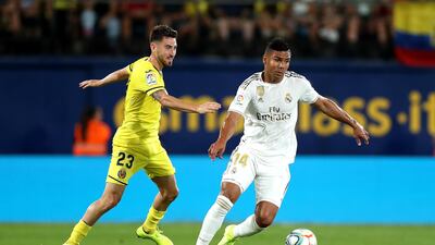 Casemiro of Real Madrid is tackled by Moi Gomez of Villarreal during the Liga match between Villarreal CF and Real Madrid CF at Estadio de la Ceramica, Villareal, Spain. Getty Images