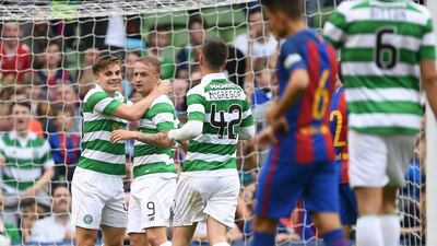Leigh Griffiths (2nd L) of Celtic celebrates after scoring during the International Champions Cup series match between Barcelona and Celtic at Aviva Stadium on July 30, 2016 in Dublin, Ireland. Charles McQuillan / Getty Images