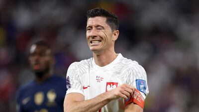 Robert Lewandowski of Poland reacts after France scored their second goal. Getty