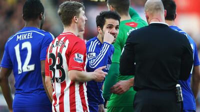 Chelsea’s Cesc Fabregas argues with referee Anthony Taylor after his ‘dive’. Michael Steele / Getty Images