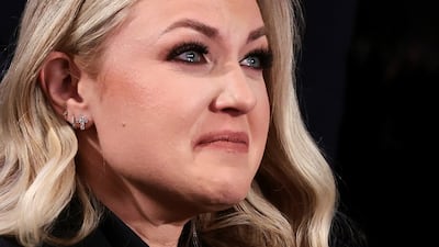 Erika Kirk, the widow of killed conservative activist Charlie Kirk, reacts after being mentioned in Mr Trump's State of the Union address. Reuters