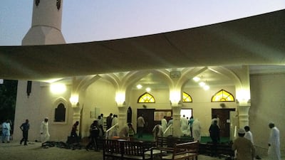 Day 4 'There is not much time between the call for breaking the fast and call for the Magreb Prayer. We should eat only dates and water to break our fast before praying, but we eat a little more. That's why you see people run to the mosque so they're not late for the prayer'. Ammar Al Attar for The National