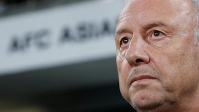 United Arab Emirates' head coach Alberto Zaccheroni stands on the touchline before the AFC Asian Cup quarterfinal soccer match between United Arab Emirates and Australia at Hazza Bin Zayed Stadium in Al Ain, United Arab Emirates, Friday, Jan. 25, 2019. (AP Photo/Hassan Ammar)