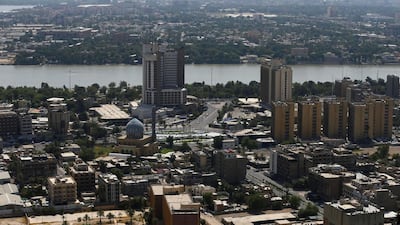 An aerial view of Baghdad. Iraq's economy shrank by about 11 per cent last year due to the Covid-19 pandemic and a sharp decline in oil revenue. Reuters