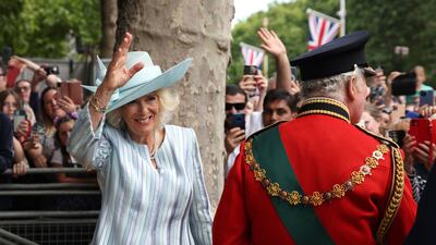 Camilla, Duchess of Cornwall, and Prince Charles greet royal well-wishers near Buckingham Palace. Bloomberg