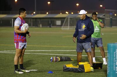 Noah Perelini, left, and rugby coach father Apollo Perelini. Apollo, a former dual code rugby international, had intended to send his son to boaridng school in England to continue his rugby education but Noah insisted on moving to New Zealand. Pawan Singh / The National