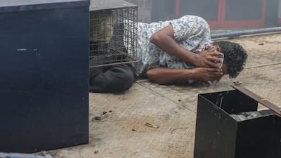 An injured protester during an anti-government demonstration in Colombo. EPA