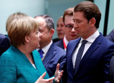 German Chancellor Angela Merkel talks with Austrian Chancellor Sebastian Kurz as they attend a European Union leaders summit in Brussels, Belgium, June 28, 2018. REUTERS/Francois Lenoir