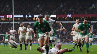 Ireland wing Jacob Stockdale on his way to touching down his side'ss third try during the Six Nations match against England at Twickenham that helped clinch only a third Grand Slam for Ireland. Shaun Botterill / Getty Images