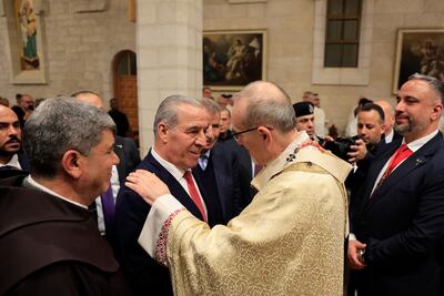 Palestinian Vice President Hussein Al Sheikh greets acting Latin Patriarch of Jerusalem Pierbattista Pizzaballa at the Church of the Nativity. AFP