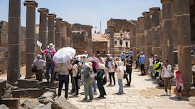 Visitors tour the ancient city of Bosra in southern Syria. The country is recording a sharp rise in visitor numbers as it seeks to rebuild its tourism industry after years of conflict and economic isolation. AFP