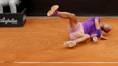Rafael Nadal after tripping over a lifted line on the court. AP