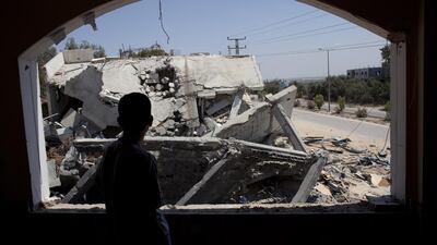 A Palestinian surveys destruction in the Gaza Strip wrought by the Israeli military. Heidi Levine / The National