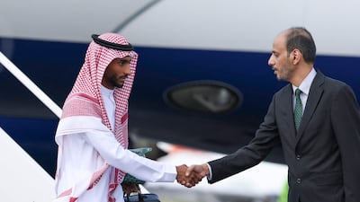 Moteb Al Harbi, a defender for Al Hilal and the Saudi Arabian national team, greets an official at Austin-Bergstrom International Airport. AFP