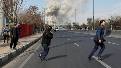 Iranians flee as a strike hits Tehran, with the US and Israel launching more attacks on the country. Reuters