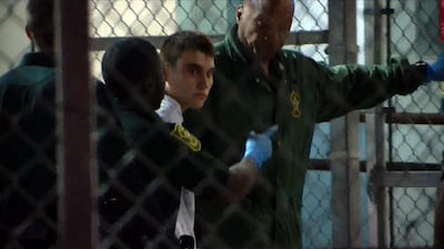 Nikolas Cruz is taken into custody at Broward County Jail in Fort Lauderdale, Florida, on February 15, 2018 after 17 people were shot dead at Marjory Stoneman Douglas High School in Parkland, Florida. Miguel Guttierez / AFP TV / AFP
