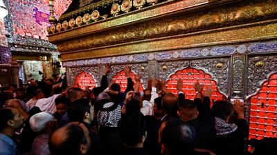 Shiite pilgrims gather at the shrine