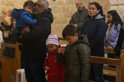 The congregation at the Church of St Sergius and Bacchus in Maaloula, whose population dropped sharply during Syria's civil war. Matt Kynaston / The National