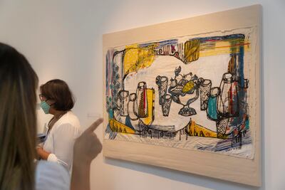 'Feast II' by Ghalia Kalaji hints at the communal and familial side of food. Antonie Robertson / The National