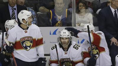 11. Florida Panthers right wing Jaromir Jagr, No 68, from the Czech Republic, is congratulated by Colton Sceviour, right, after Jagr's 1,900th career point on an assist on Aleksander Barkov's goal during the third period of an NHL game against the San Jose Sharks in San Jose on Wednesday. The Panthers won 6-5 in overtime. Jeff Chiu / AP Photo