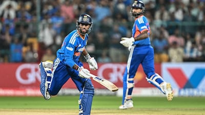 India's Tilak Varma, left, and captain Shreyas Iyer during the fifth T20 against West Indies in Bengaluru. AFP