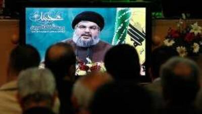 Lebanese Hizbollah supporters in Beirut listen to Sheikh Hassan Nasrallah via video link on Friday.