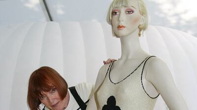 Quant dresses a model in one of her looks in Paris, 2004. AFP