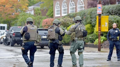 Police respond to an active shooter situation at the Tree of Life synagogue on Wildins Avenue in the Squirrel Hill neighbourhood of Pittsburgh. AP