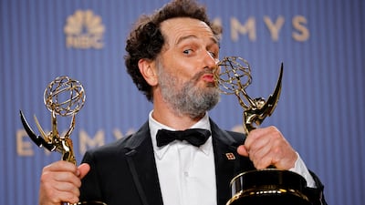 Matthew Rhys poses with the Emmys for Outstanding Lead Actor in a Comedy Series for Widow's Bay and Outstanding Lead actor in a limited or anthology series for The Beast in Me. Reuters