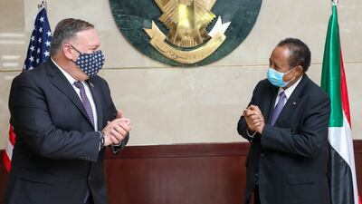 In December 2019, Mike Pompeo, who was serving as secretary of state at the time, said the US would appoint an ambassador to Sudan. Here he meets Abdalla Hamdok, Sudanese prime minister at the time, in Khartoum. AFP