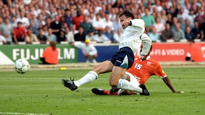 Teddy Sheringham scores for England against the Netherlands at Wembley in the European Championship finals in 1996.