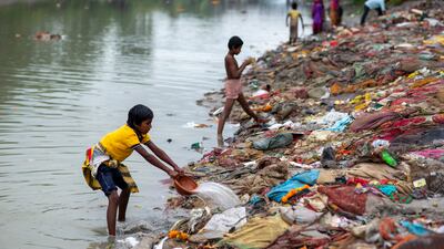 Waste piles on the bank of Ganges Canal at Muradnagar. Getty