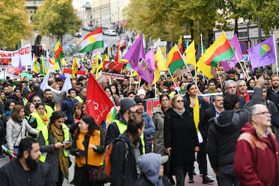 Kurdish protesters take part in a demonstration in Stockholm in October 2019 against Turkey's assault on Kurdish-held border towns in north-eastern Syria. AFP