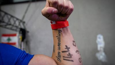 Lebanese arm wrestler Miled Zakhia poses for a photograph.