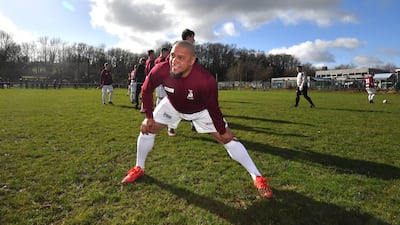 Roberto Carlos warms up ahead of playing for Bull in the Barne United. PA