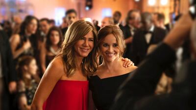 Jennifer Aniston, left, and Reese Witherspoon in a scene from 'The Morning Show'. AP.