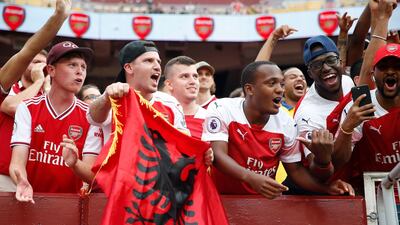 Arsenal fans cheer from the stands at FedEx Field. Reuters