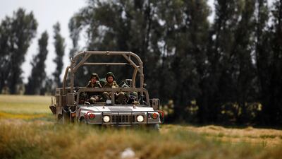 Israeli soldiers on the border between Israel and the Gaza Strip on March 18, 2018. Amir Cohen / Reuters
