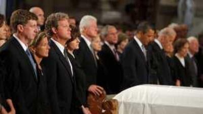 From left, Edward Kennedy's son Patrick, daughter Kara Kennedy Allen, son Edward Kennedy Jr, widow Vicki Reggie, the former president Bill Clinton, the Secretary of State Hillary Clinton, the former president George W Bush and his wife Laura, the President Barack Obama and first lady Michelle, the Vice President Joseph Biden and his wife Jill, the former first lady Rosalynn Carter and the former president Jimmy Carter at the funeral services in Boston yesterday.