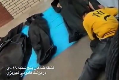 A screengrab from a video shows people breaking down after identifying loved ones in body bags outside Kahrizak Forensic Medical Centre in Tehran. AFP