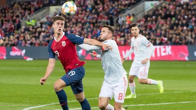 Norway's Markus Henriksen, left fights for the ball against Spain's Saúl Ñíguez right, during the UEFA Euro 2020 qualifying Group F soccer match between Norway and Spain at Ullevaal Stadium in Oslo, Norway. AP