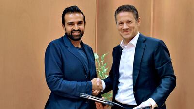 Badr Jafar, the chief executive of Crescent Enterprises, right, and Ashish Thakkar, the founder of Mara Group.