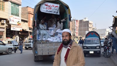 Ashfaq Ahmed, waited for hours outside a shop in Rampura Peshawar to get flour for his family.