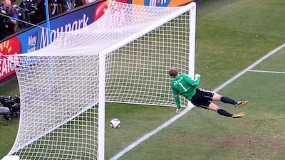 Manuel Neuer of Germany watches the ball bounce over the line from a Frank Lampard shot that hit the crossbar, but referee Jorge Larrionda judged the ball did not cross the line. Cameron Spencer / Getty Images