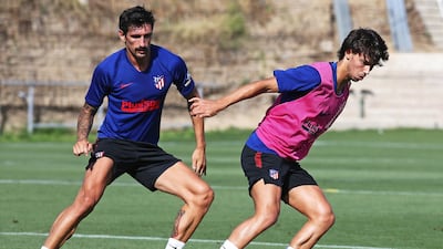 Stefan Savic and Joao Felix. EPA