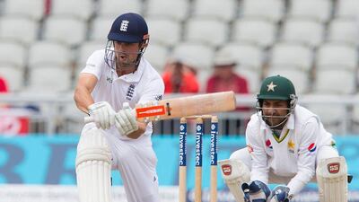 England's Alastair Cook plays a shot Monday against Pakistan at the Old Trafford Cricket Ground in Manchester, England. (AFP)