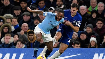 Manchester City's Raheem Sterling, left, was the target of racist abuse from Chelsea fans during the Premier League match at Stamford Bridge in December 2018. EPA